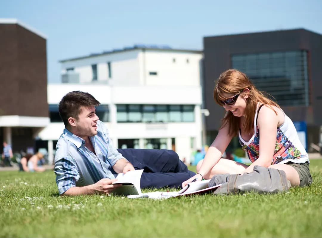 University of Reading, student studying outdoor campus